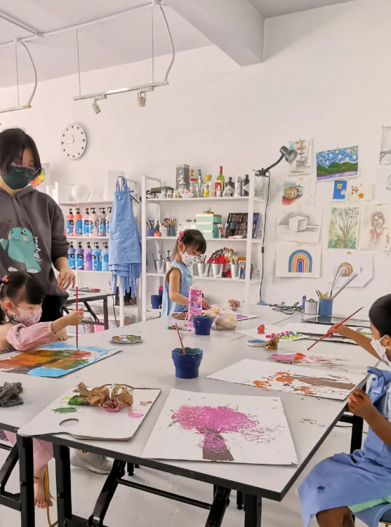 Children painting during a class at Wondrous Art Studio